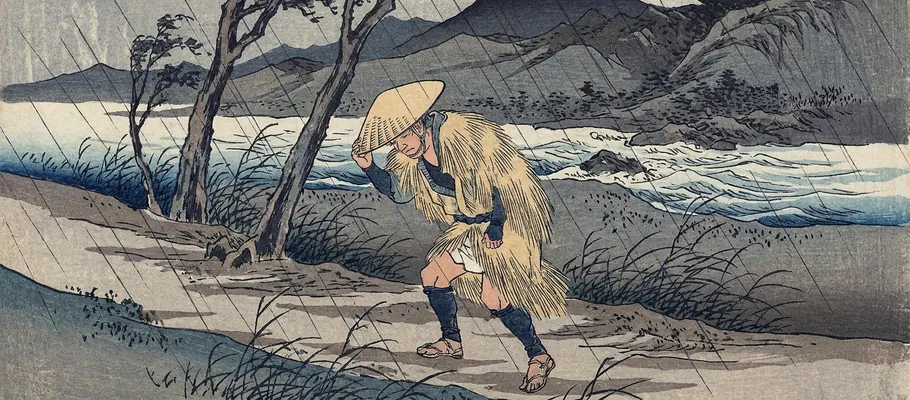 A weary traveler with a bamboo hat, being forced onward along a muddy path by harsh, driving rain and strong winds.